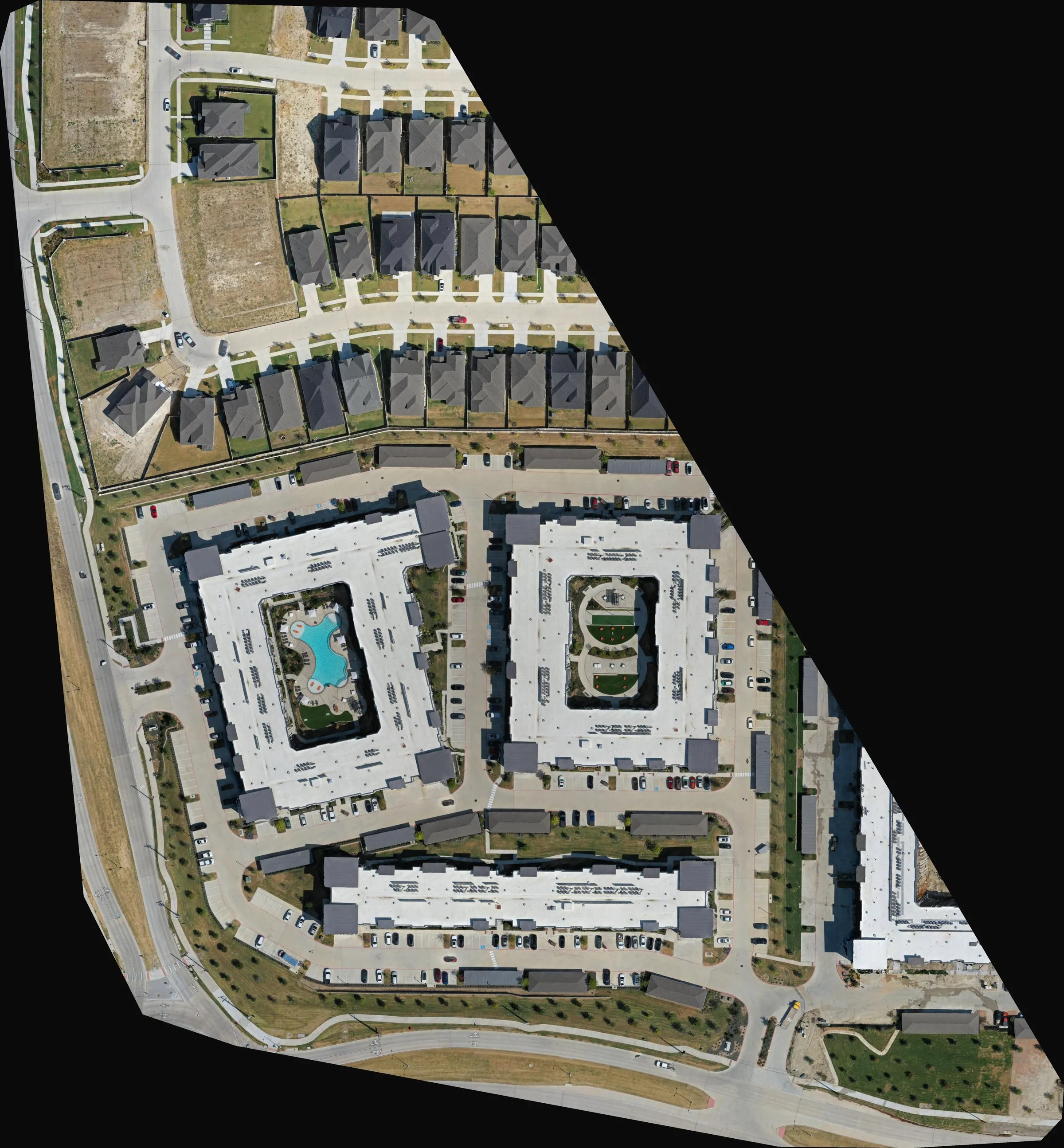 Orthomosaic of a 27-acre multifamily site in McKinney, Texas, stitched from 343 drone photographs