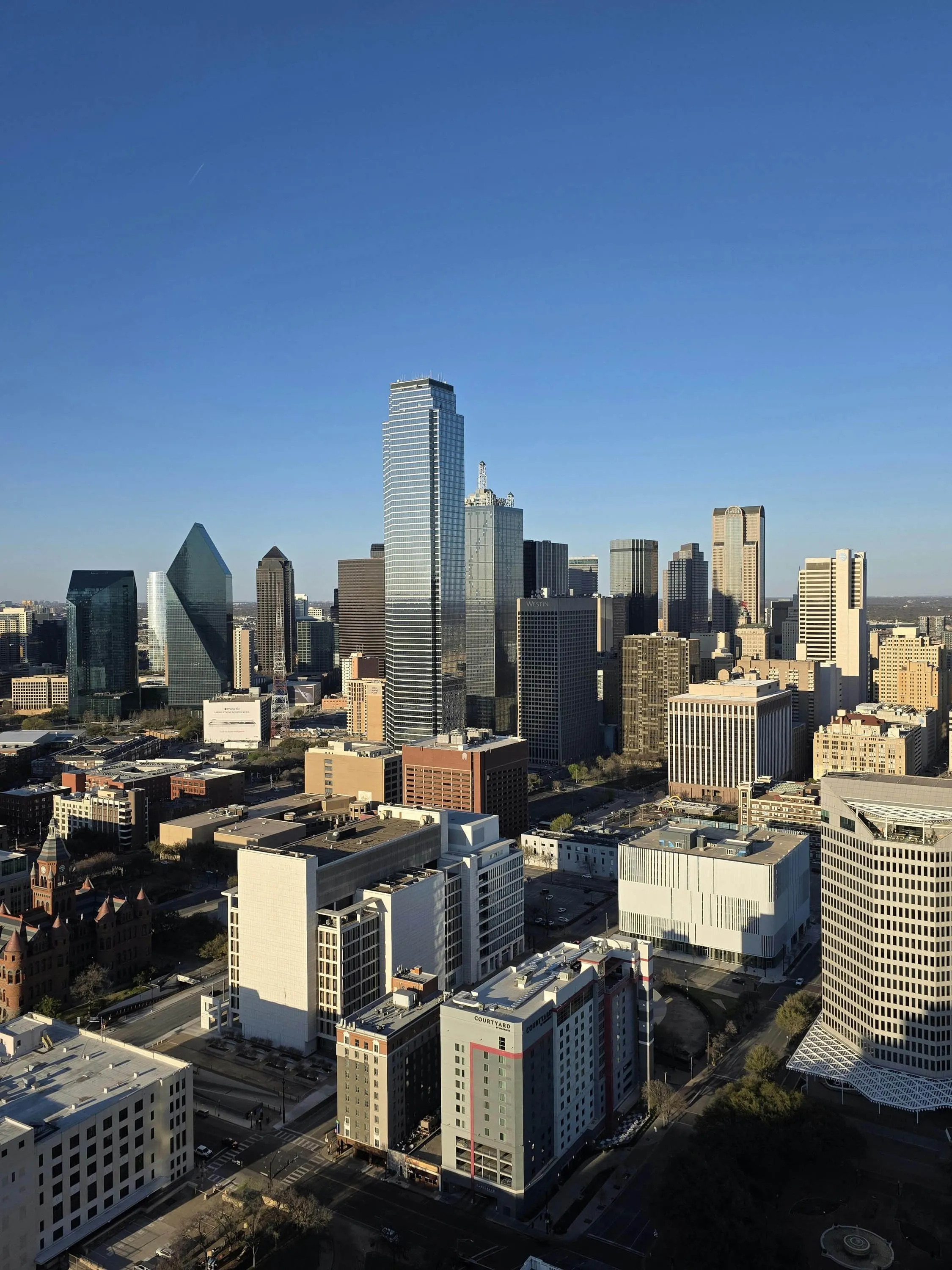 Aerial drone photograph of the downtown Dallas skyline on a clear day