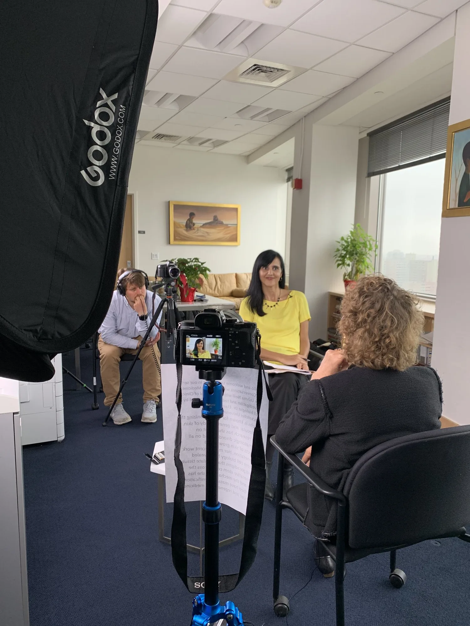 Physician interview for Conversations with Giants in Medicine, lit with a softbox in an office