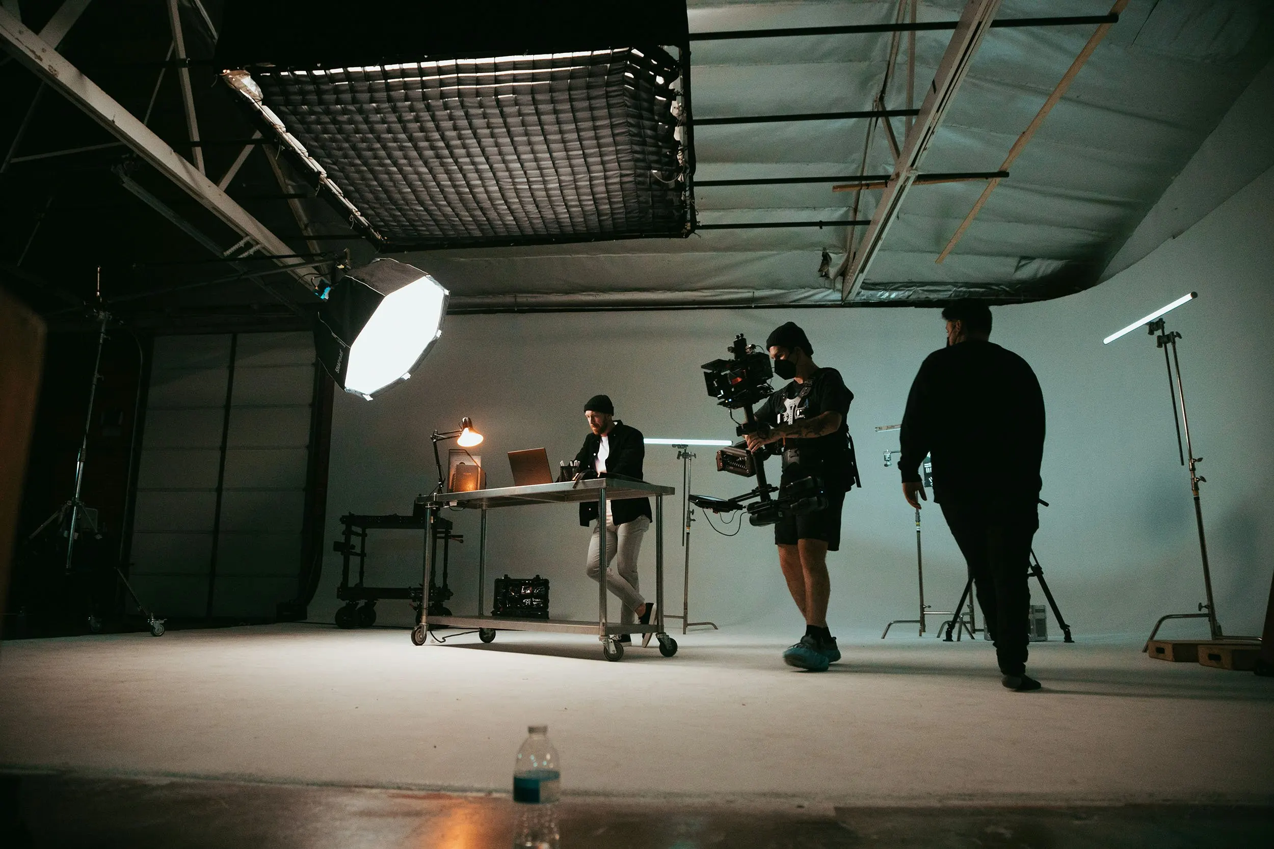 Executive being interviewed on camera with professional cinema lighting