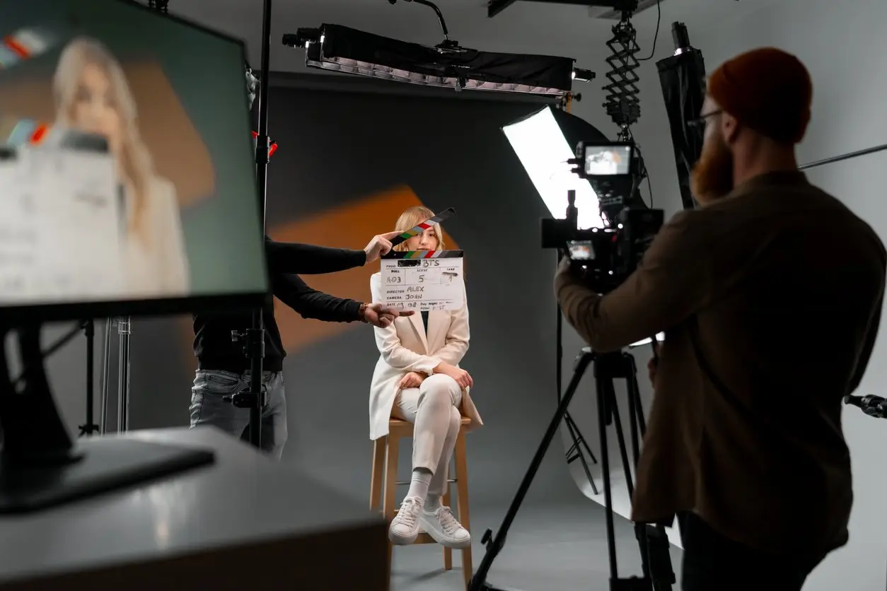 Clapperboard marking a take during an on-camera interview